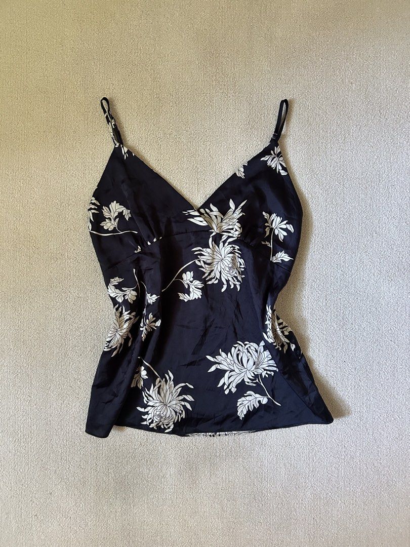 Silk graphic top (Category: Others Tops) located in Quezon City. Submitted by y2klar (Listing ID 1461959388, Image 1). Description: Black Silk Cami top Size-Small-Medium 10/10 Condition no flaws..