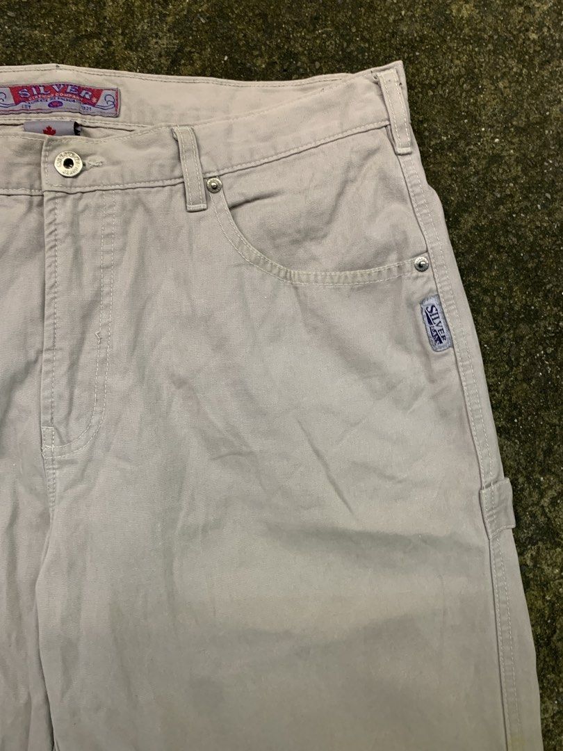 Silver Jeans Co. Beige Carpenter Pants (Category: Jeans) located in Manila. Submitted by loyspalencia (Listing ID 1461848551, Image 3). Description: - Beige carpenter pants from Silver Jeans Co. - Classic fit for comfortable wear. - Durable cotton blend fabric. - Features multiple functional pockets. - Versatile for work or casual outfits. - Easy to pair with any top. - Silver Jeans Carpenter Pants Dimes: W-20 / L-42 / Waistline- 18/ Helm-10.5.