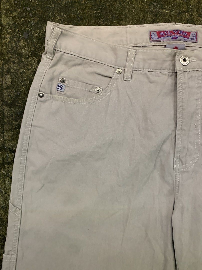 Silver Jeans Co. Beige Carpenter Pants (Category: Jeans) located in Manila. Submitted by loyspalencia (Listing ID 1461848551, Image 2). Description: - Beige carpenter pants from Silver Jeans Co. - Classic fit for comfortable wear. - Durable cotton blend fabric. - Features multiple functional pockets. - Versatile for work or casual outfits. - Easy to pair with any top. - Silver Jeans Carpenter Pants Dimes: W-20 / L-42 / Waistline- 18/ Helm-10.5.