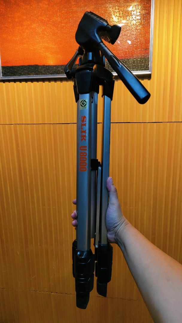 SLIK U8000 ST-60 Tripod (Category: Tripods & Monopods) located in Bulacan. Submitted by babz30261 (Listing ID 1461916754, Image 2). Description: - Sturdy SLIK U8000 ST-60 tripod - Securely extending and locking legs - Adjustable tilt and pan head for versatile angles - Ideal for photography and videography - Folds down for convenient transport - Feel free to ask questions!.