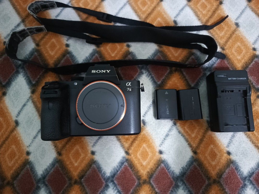 Sony Alpha a7 II Mirrorless body only (Category: Cameras) located in Manila. Submitted by jezmanree (Listing ID 1461998695, Image 1). Description: - Sony Alpha a7 II camera body - Original strap included - Two (2) batteries pero isama ko nayung Isang batt so 3 na - Battery charger - Clean sensor prefer meet up.