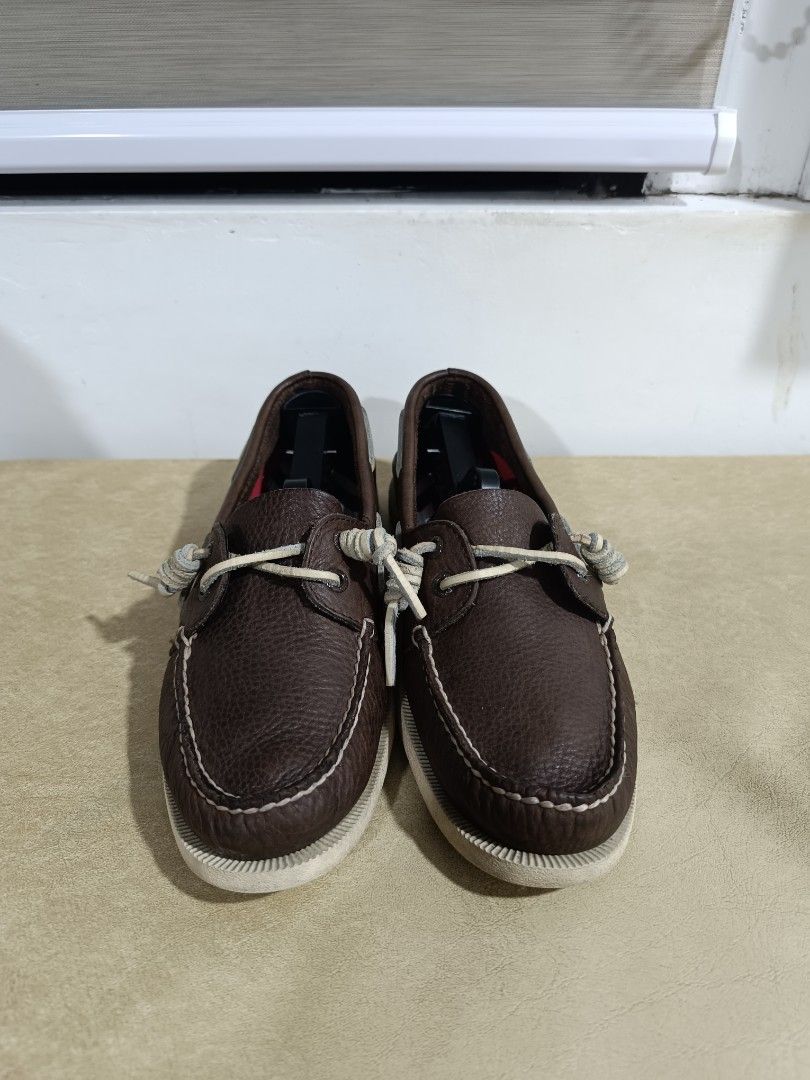Sperry Top-Sider Brown Leather Boat Shoes (Category: Casual Shoes) located in Iloilo. Submitted by minemo216 (Listing ID 1462017741, Image 1). Description: Classic brown leather boat shoes from Sperry. Features a textured leather upper and white contrast stitching. The soles are non-marking, great for any surface. These are a timeless style, perfect for casual wear. The inside lining has a cool striped pattern..