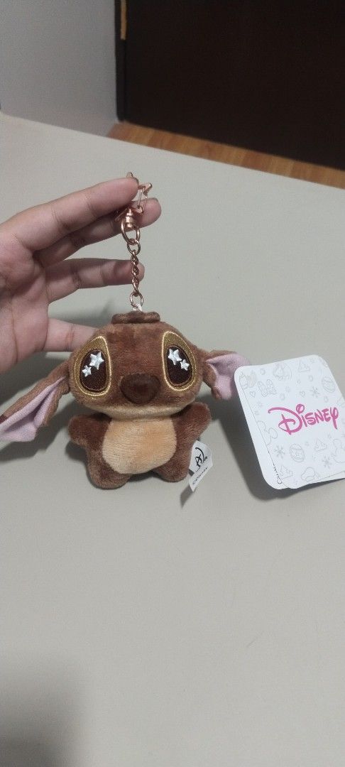 Stitch Plush Keychain (Category: Plushies & Soft Toys) located in Manila. Submitted by niq45762 (Listing ID 1461953837, Image 1). Description: - Official Disney plush keychain with paper tag shipping will be shouldered by buyer.