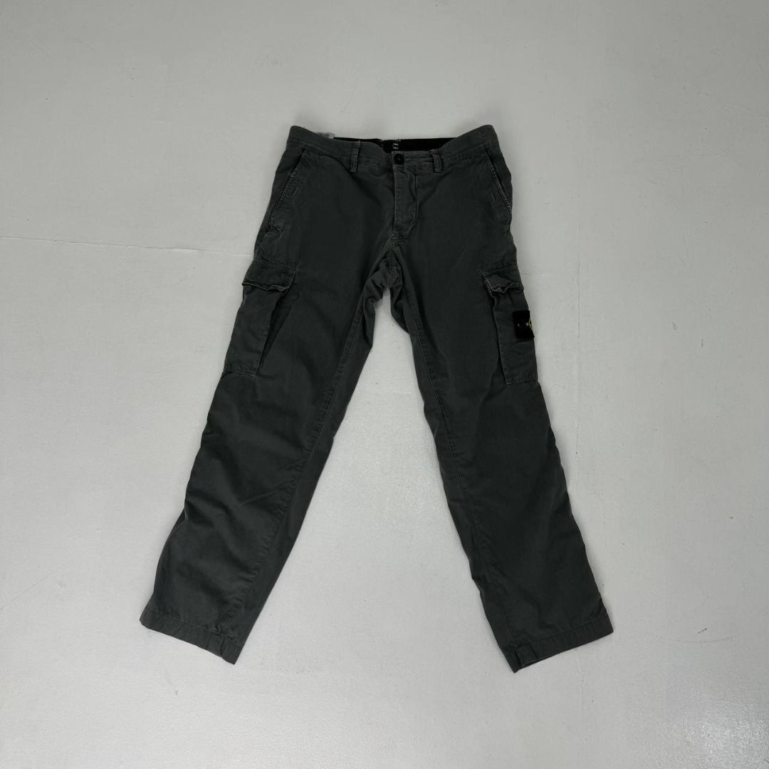 Stone Island Multipocket Cargo pants (Category: Luxury Apparel) located in Quezon City. Submitted by johnpaulperezzz (Listing ID 1461902274, Image 3). Description: NAME: Stone Island Multipocket Cargo pants COLOR: Dark gray SIZE: 33 FIT: 32 Dimension: Waist: 16 Inseam: 28 Front Rise: 9 Thigh: 10 Knee: 7 Leg Opening: 5 CONDITION: 9/10 ISSUE: -none PRICE: 10k .