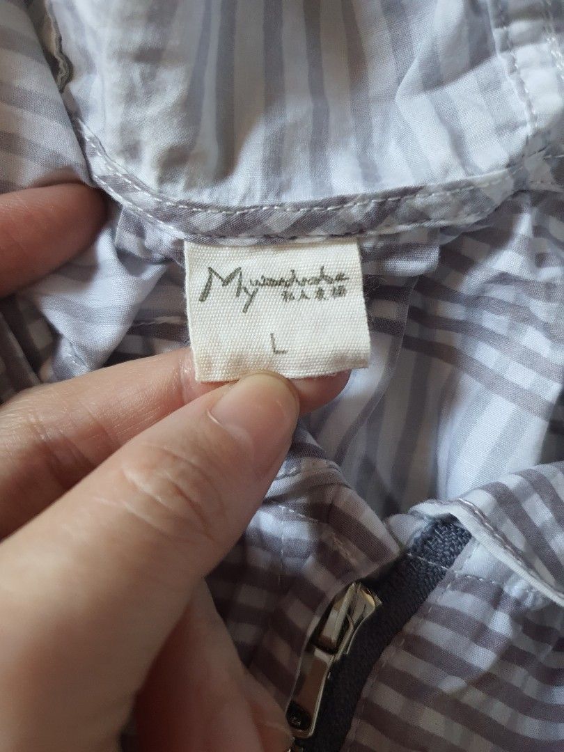 Striped Zip-Up Jacket Size L (Category: Coats, Jackets and Outerwear) located in Meycauayan. Submitted by shoptoown (Listing ID 1461836099, Image 3). Description: - Lightweight jacket - Grey and white stripe pattern - Full zip-up front - Drawstring at the waist - Two side pockets - Ideal for layering - Comfortable and casual.