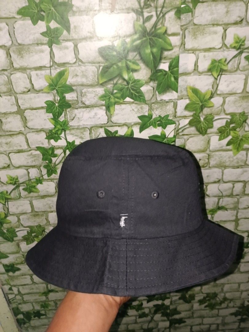 Stussy Black Bucket Hat (Category: Caps & Hats) located in Carcar. Submitted by rolandobac92675 (Listing ID 1461819889, Image 2). Description: - Classic black Stussy bucket hat - Simple and versatile design - Embroidered Stussy logo on the front - Small Stussy tag on the side - One size fits most - Ideal for sunny days and streetwear outfits.