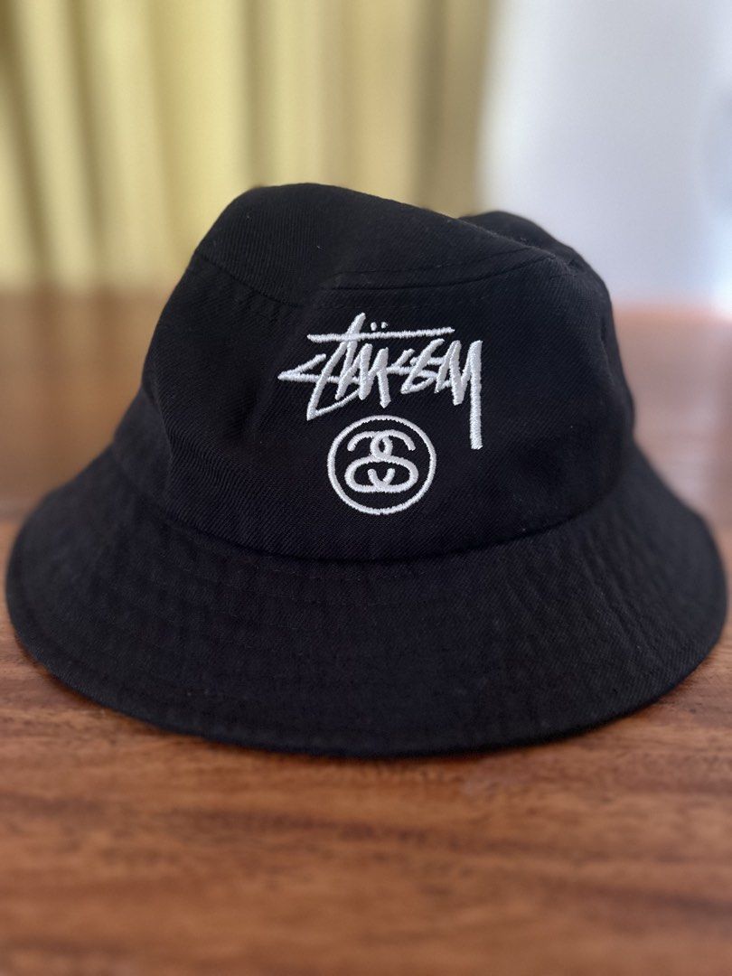 Stussy Bucket Hat Black S/M (Category: Caps & Hats) located in Pulilan. Submitted by koty187 (Listing ID 1461854678, Image 1). Description: - Classic Stussy bucket hat in black - Material: 80% Acrylic, 20% Wool - Size: S/M - Perfect for everyday wear and keeping the sun out of your eyes - Stylish and versatile accessory - Made in Bangladesh.