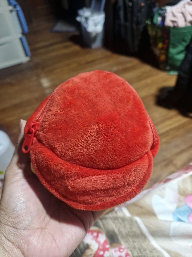 Super Mario Plush Coin Pouch Keychain Red (Category: Character Goods) located in Manila. Submitted by veelafiera (Listing ID 1461946336, Image 2). Description: - Officially licensed Nintendo Mario hat plush coin pouch. - Features the iconic 'M' logo. - Zipper closure for secure storage. - Compact size, ideal for attaching to bags or keys. - Perfect for holding coins, earbuds, or other small essentials..