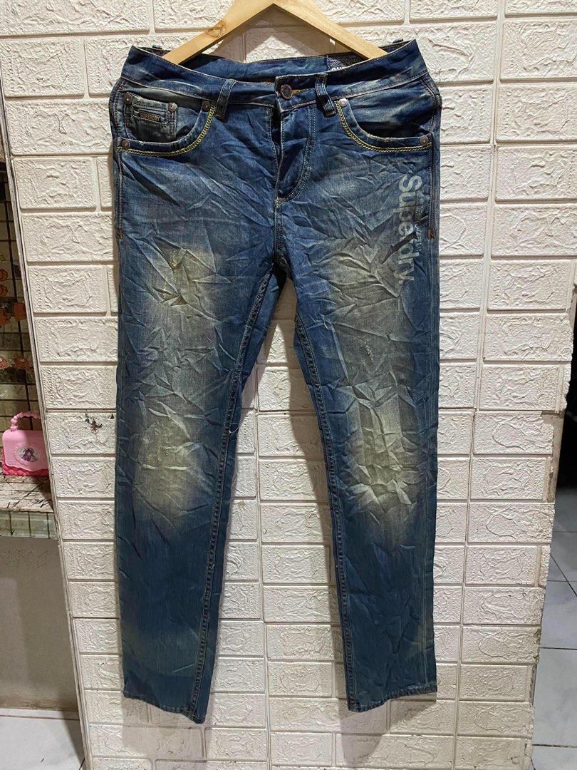 Superdry Vintage Blue Denim Jeans (Category: Jeans) located in Rizal. Submitted by tiangarcia02 (Listing ID 1461934483, Image 1). Description: - Superdry blue denim jeans - Vintage wash with distressed detailing - Straight leg fit - Features Superdry logo printed on the side - Ideal for casual wear.