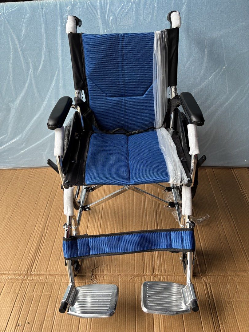 Sure-Guard Lightweight Folding Wheelchair Blue (Category: Wheelchairs) located in Manila. Submitted by rosel2001 (Listing ID 1461831175, Image 1). Description: - Lightweight and foldable for easy transport and storage - Padded seat and backrest for maximum comfort - Includes armrests and footrests - Equipped with a seatbelt for enhanced safety - Perfect mobility assistance solution - Ready for a new home.