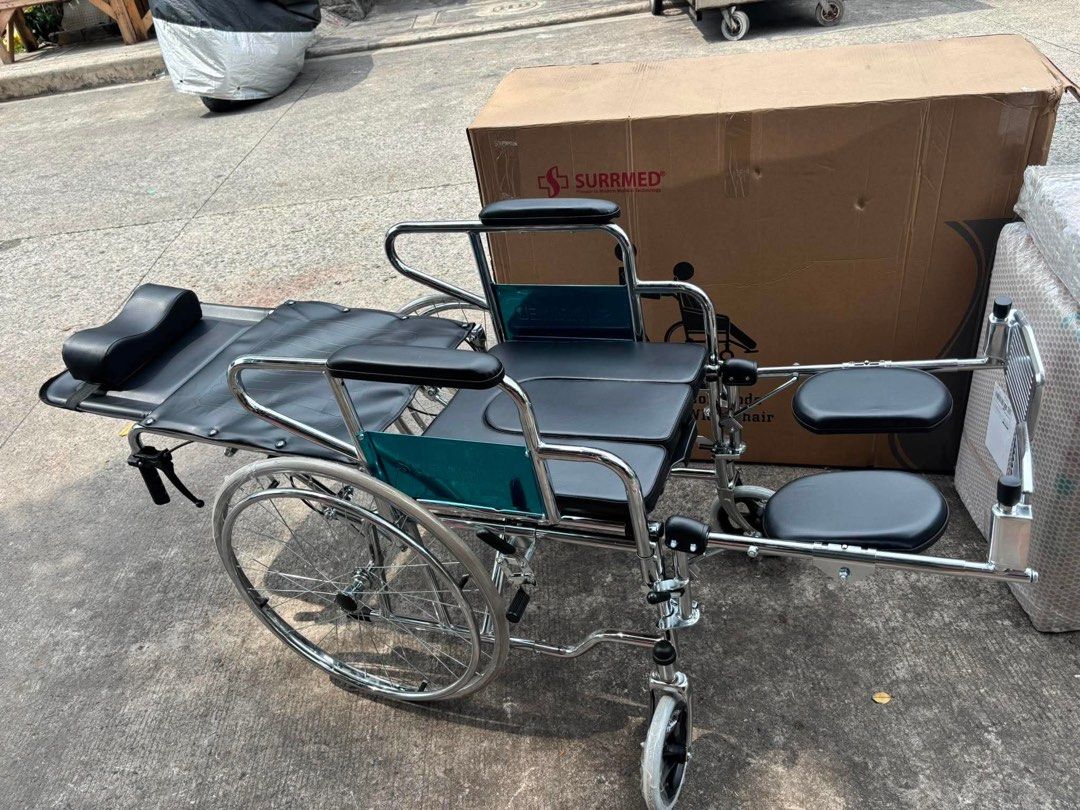Surrmed Reclining Commode Standard Wheelchair (Category: Wheelchairs) located in Manila. Submitted by rosel2001 (Listing ID 1461830847, Image 3). Description: - Reclining commode wheelchair by Surrmed - Standard model with adjustable backrest for multiple angles - Adjustable footrests for personalized comfort - Features a commode opening - Provides great comfort and support - Includes original packaging.