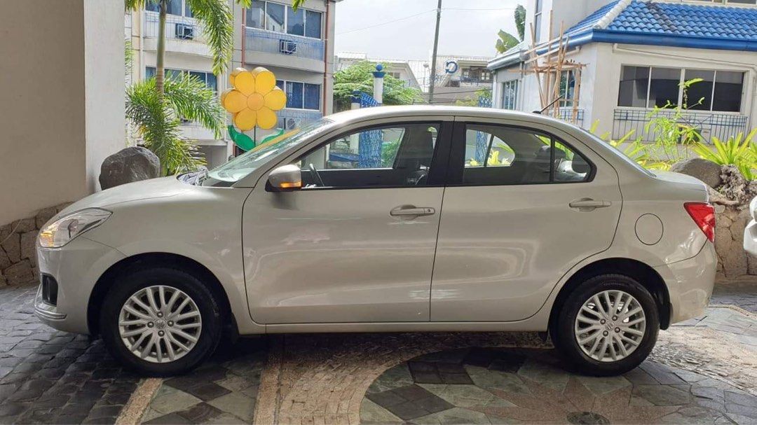 Suzuki Dzire - Manual (Category: Used Cars) located in Manila. Submitted by maui84 (Listing ID 1461852674, Image 2). Description: Make and Model: Suzuki Dzire Year Model: 2019 Transmission: Manual 23k milage All stock, All original Keyless entry Cold Aircon First Owned / Lady Owned In Excellent Condition Gas and go Unit Price: 300,000.
