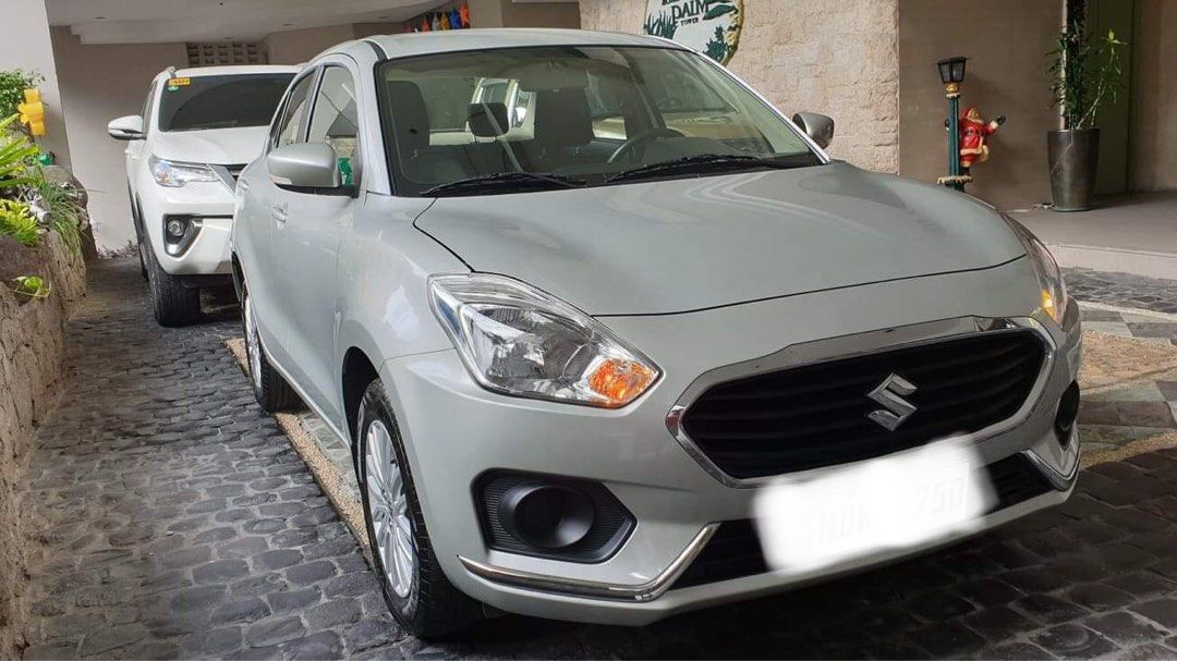 Suzuki Dzire - Manual (Category: Used Cars) located in Manila. Submitted by maui84 (Listing ID 1461852674, Image 3). Description: Make and Model: Suzuki Dzire Year Model: 2019 Transmission: Manual 23k milage All stock, All original Keyless entry Cold Aircon First Owned / Lady Owned In Excellent Condition Gas and go Unit Price: 300,000.