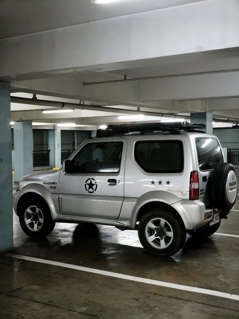 Suzuki Jimny 1.3 (A) (Category: Used Cars) located in Makati City. Submitted by silva21 (Listing ID 1461934172, Image 3). Description: Suzuki Jimny 2011 4x4 Automatic •In good condition •98,000 mileage •2025 tires Maintenance did for 2026 as it reached 90,000 mileage: • Engine oil • ATF oil • Replaced radiator (for maintenance) • Replaced hose (for maintenance) • Engine Overhaul (for maintenance) • Repaint for front and rear bumper (due for its a