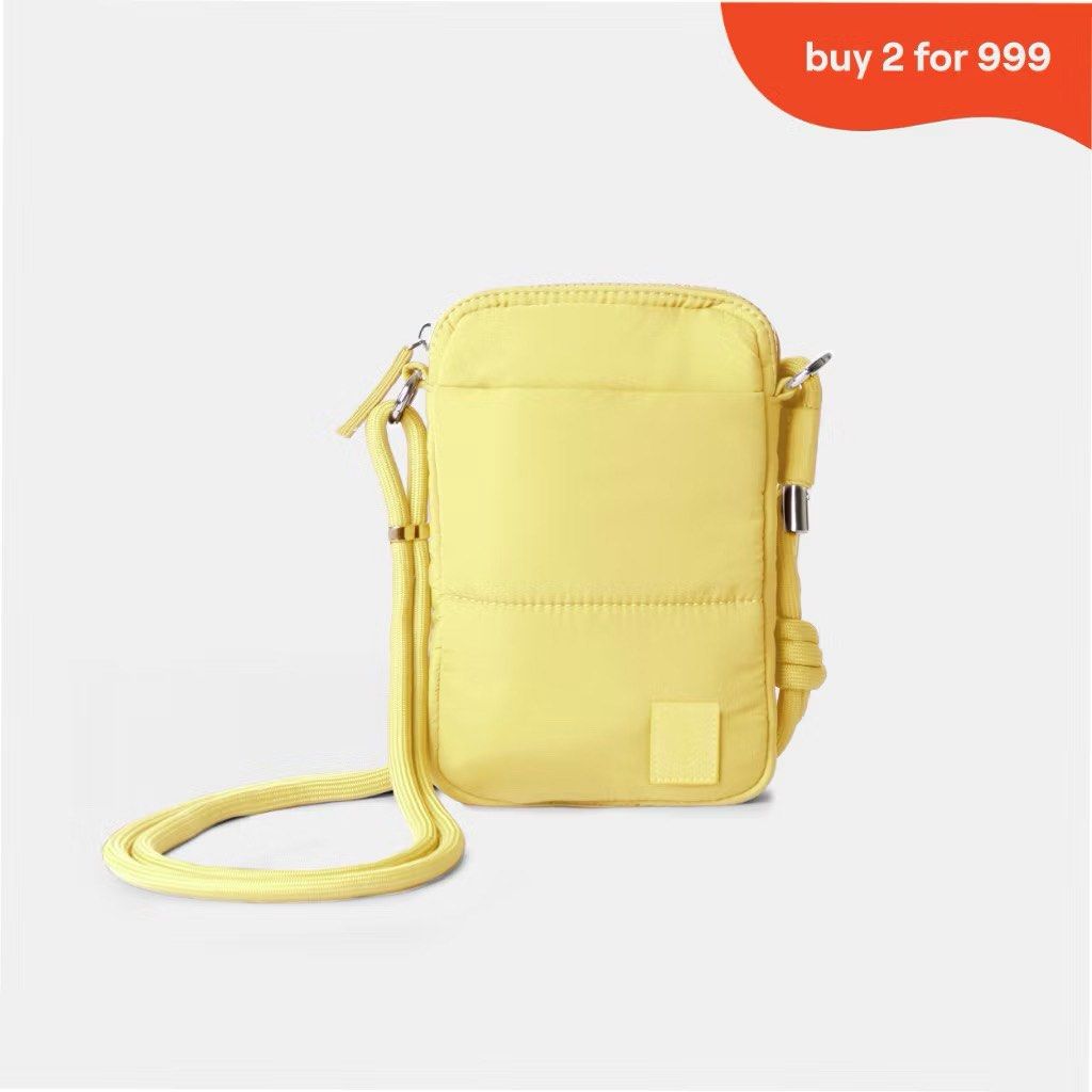 SWD - YELLOW SLING BAG (Category: Cross-body Bags) located in San Mateo. Submitted by alperez.princess (Listing ID 1461938994, Image 1). Description: - Cute yellow padded crossbody bag - Features a front pocket and a main compartment - Adjustable strap for versatile wear (crossbody or shoulder) - Ideal for carrying essentials - Perfect for everyday use or travel.