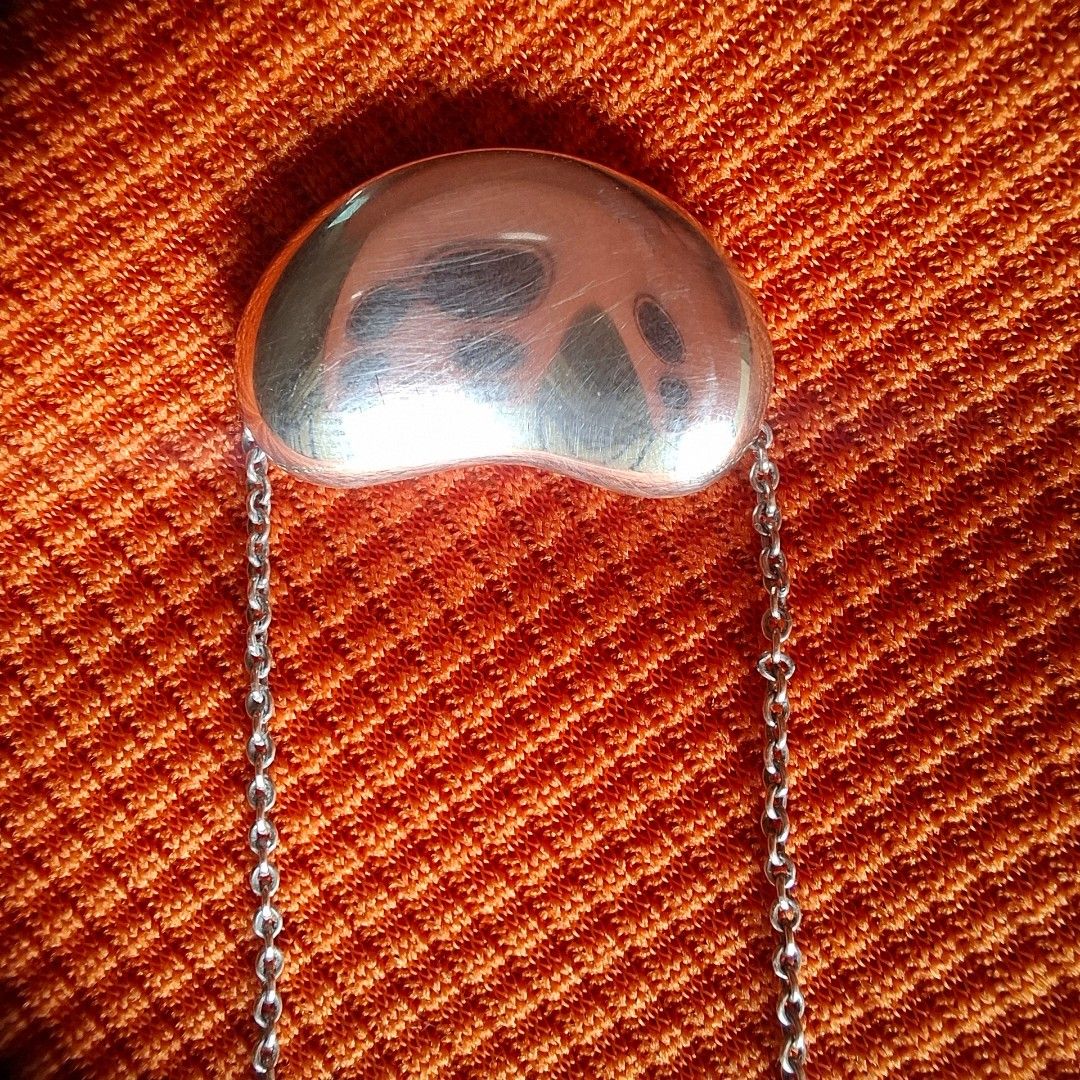 T&CO Bean (Category: Necklaces) located in Quezon City. Submitted by reuserecyclereclaim (Listing ID 1461952450, Image 2). Description: 💯 - Sterling silver bean pendant - Pendant size: approx. 2cm - Chain length: approx. 16 inches - Minor scratches on pendant from normal wear - Classic and timeless piece.