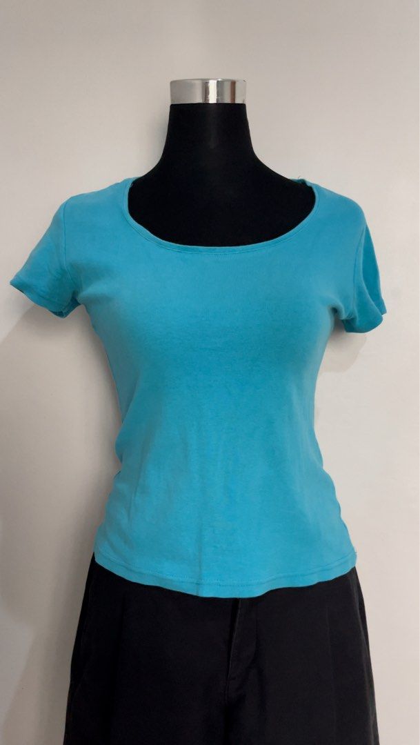 teal top (Category: Blouses) located in Santa Rosa. Submitted by totgaaaaa (Listing ID 1461860912, Image 1). Description: - Basic blue short sleeve t-shirt - Simple and comfortable design - Ideal for everyday wear - Versatile and easy to pair with any outfit - A must-have staple for your wardrobe.