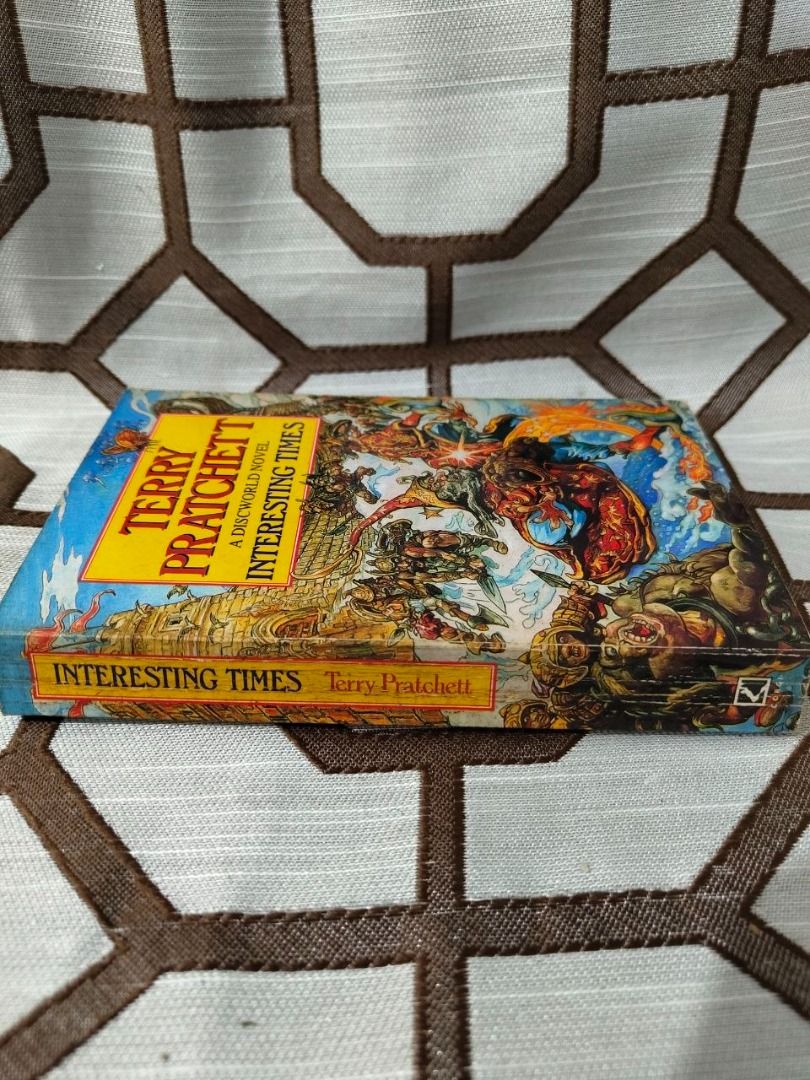 Terry Pratchett's Interesting Times: A Discworld Novel (Category: Storybooks) located in Quezon City. Submitted by daaibustamante17 (Listing ID 1461896881, Image 2). Description: - Terry Pratchett's Interesting Times - A Discworld Novel - Features the iconic cover art - A great addition to any fantasy book collection.