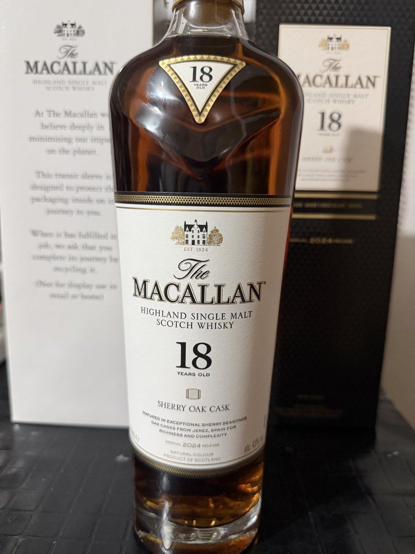 The Macallan 18 Years Old Sherry Oak Cask (Category: Beverages) located in Manila. Submitted by _valerie (Listing ID 1461917349, Image 3). Description: - The Macallan 18 Years Old Sherry Oak Cask - Matured in exceptional sherry seasoned oak casks from Jerez, Spain - Tasting Notes: Ginger, dark chocolate, dates - Comes with original box and transit sleeve - Ideal for collectors and whisky enthusiasts.