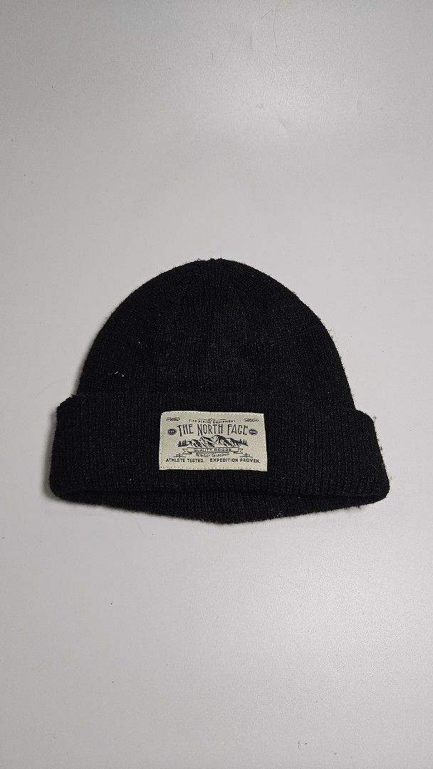 The North Face Black Knit Beanie (Category: Caps & Hats) located in Alfonso. Submitted by jbcamet (Listing ID 1461934081, Image 1). Description: - Classic black knit beanie from The North Face - Features the brand's signature logo patch - Made for alpine equipment and expedition wear - Comfortable and warm for outdoor adventures - Great for everyday use.