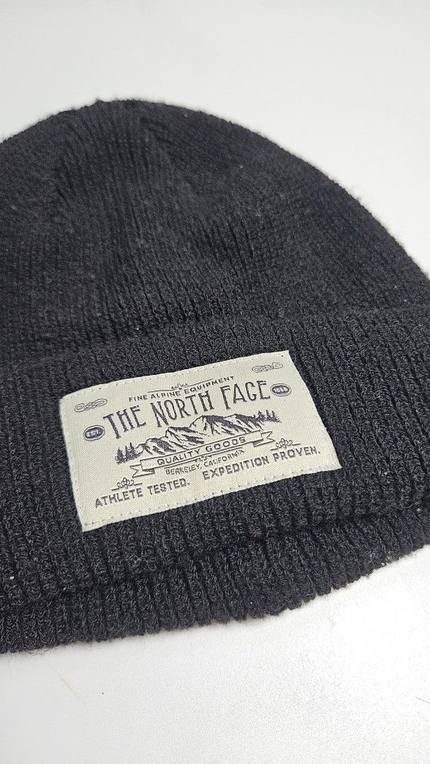 The North Face Black Knit Beanie (Category: Caps & Hats) located in Alfonso. Submitted by jbcamet (Listing ID 1461934081, Image 2). Description: - Classic black knit beanie from The North Face - Features the brand's signature logo patch - Made for alpine equipment and expedition wear - Comfortable and warm for outdoor adventures - Great for everyday use.