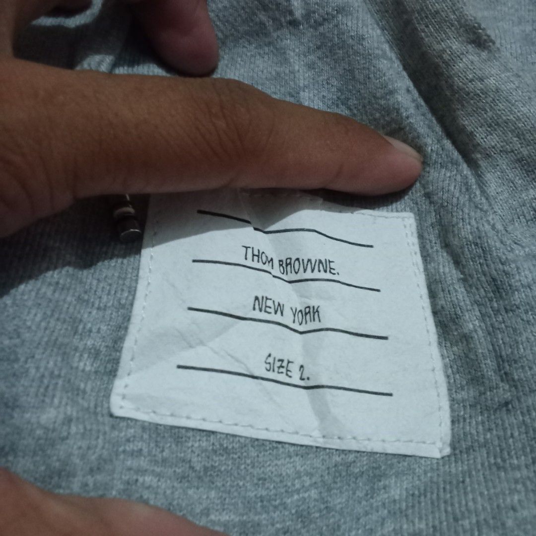 Thom Browne (Category: Coats, Jackets and Outerwear) located in Manila. Submitted by tcbukay_zxc25 (Listing ID 1461950134, Image 2). Description: Thom Browne hoodie size 2.