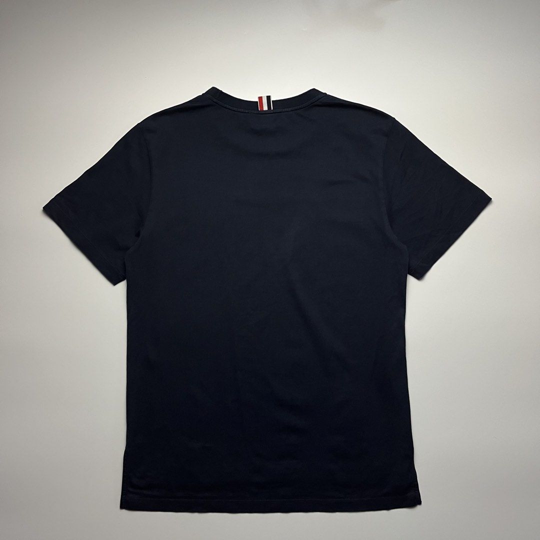Thom Browne Slide Slits Relaxed Navy Tee (Category: Luxury Apparel) located in Manila. Submitted by streetsavvy (Listing ID 1461894732, Image 2). Description: Thom Browne Slide Slits Relaxed Navy Tee Size: 2 Width: 20” Length: 27” Shoulder: 17” Sleeve Length: 8” Hem: 21” Measured in Inches Condition: Very good condition with signs of wear Flaw: Missing size tag only. Made in Japan 100% Cotton.