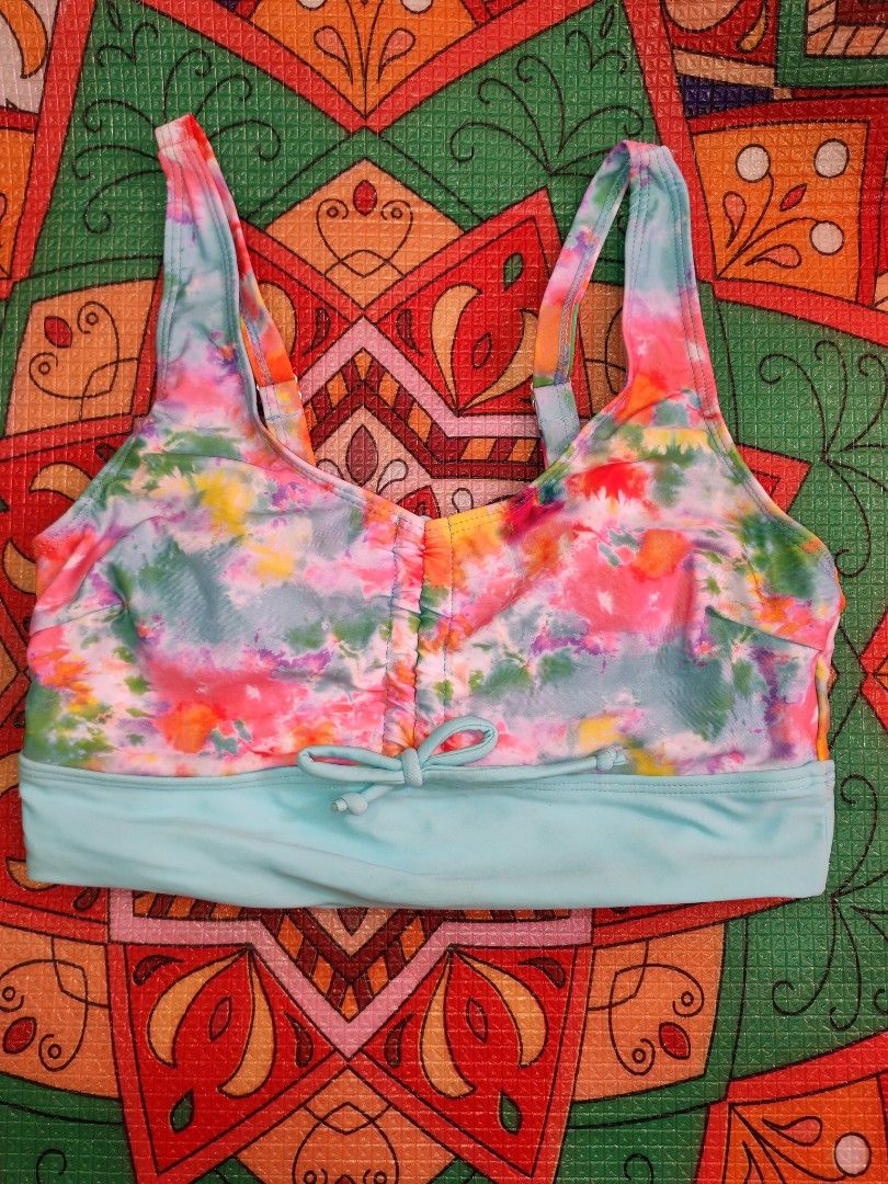 Tie-Dye Bikini Set with Light Blue Accents (Category: Bikinis & Swimsuits) located in Manila. Submitted by bavinsauga (Listing ID 1461869884, Image 2). Description: - Medium on tag - Almost like new - Reason for selling: Too small for me. Need to declutter. - Top features adjustable straps for a perfect fit. - High-waisted bottoms for a flattering silhouette. - Adjustable drawstring tie on the bottoms. - Stylish light blue waistband and trim. - I