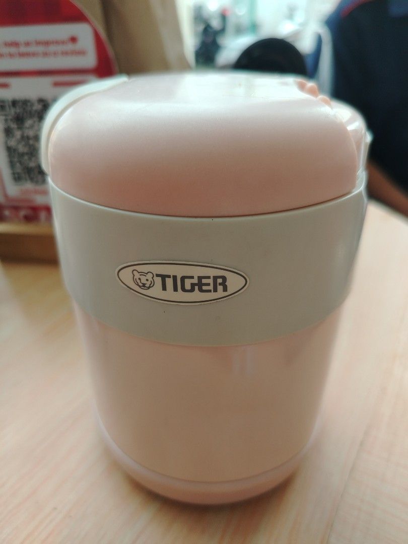 Tiger Food Jar Pink (Category: Food Organization & Storage) located in Manila. Submitted by purediamond888 (Listing ID 1462001086, Image 1). Description: - Pink Tiger food jar - Includes inner containers - Keeps food warm or cold - Easy to carry, ideal for packed lunches or snacks.