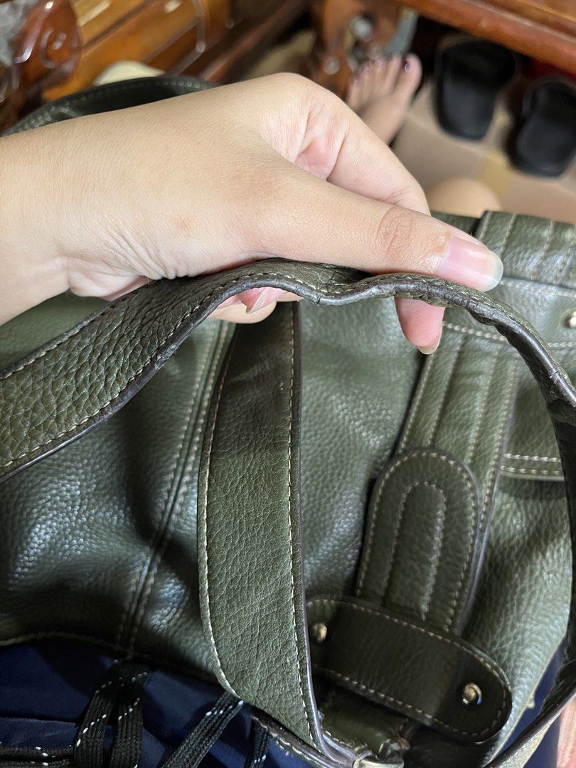 Tignanello Green Leather Shoulder Bag (Category: Shoulder Bags) located in Manila. Submitted by az0r_ (Listing ID 1461972329, Image 3). Description: - Olive green textured leather shoulder bag - Detailed stitching throughout - Two comfortable shoulder straps - Spacious interior for all your essentials - Ideal for daily use.