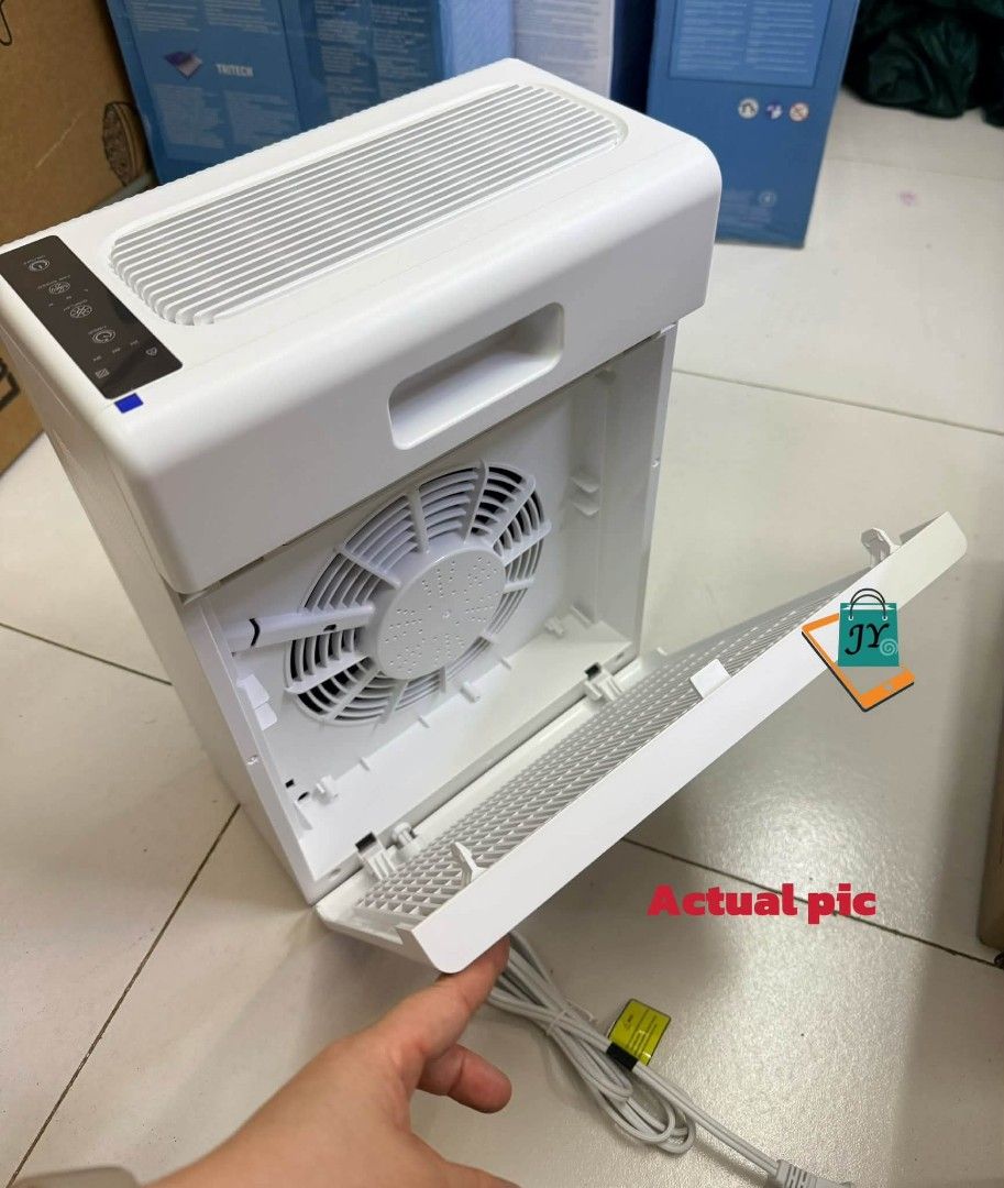 Tixx Desktop Air Purifier with Filter (Category: Air Purifiers & Dehumidifiers) located in Manila. Submitted by chaionlineshop (Listing ID 1461862308, Image 3). Description: - Tixx Desktop Air Purifier - Includes one replacement filter - Keeps your personal space fresh and clean - Simple, top-mounted controls - Compact design fits easily on any desk - Power cord included.