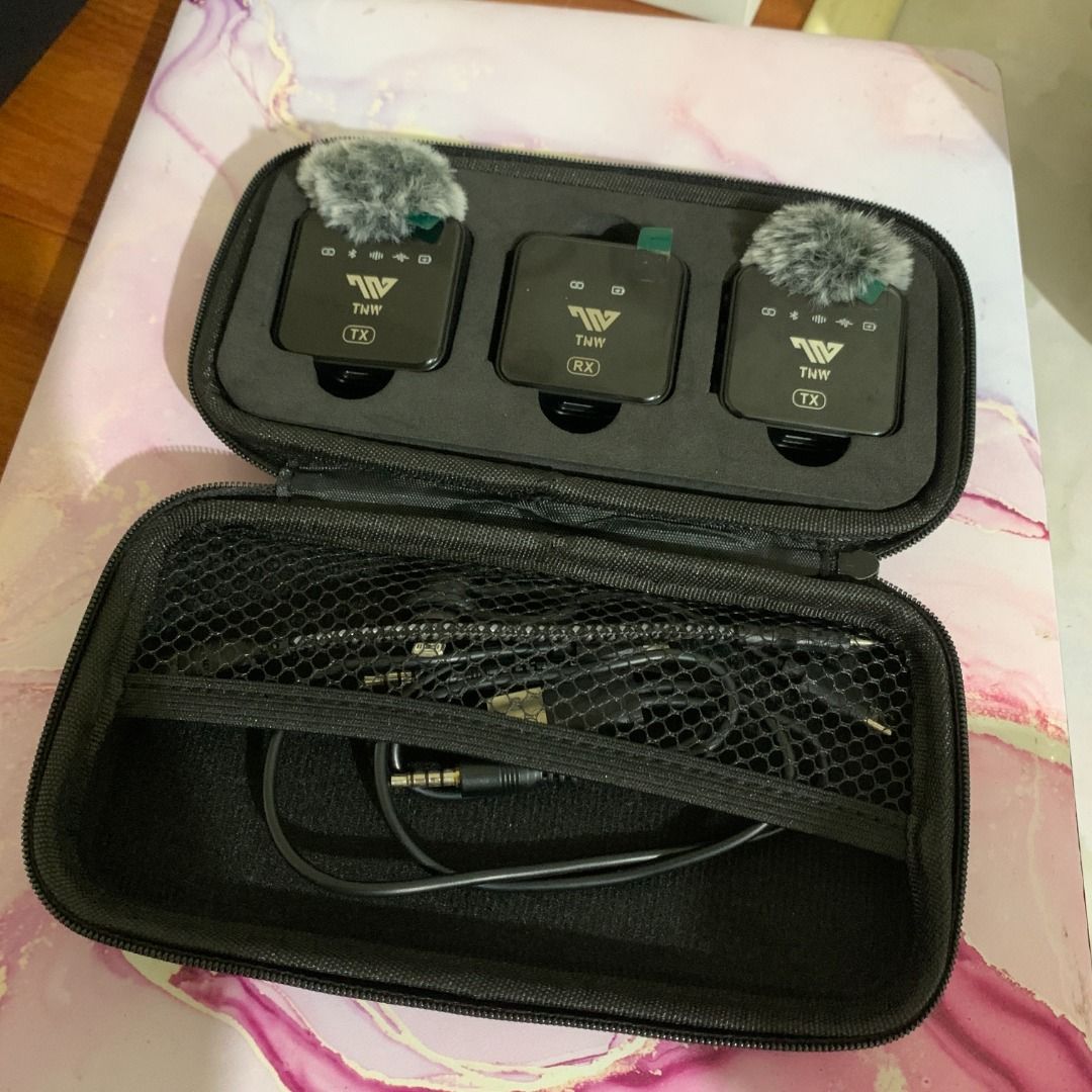 TNW N9/N8 Wireless Lavalier Microphone (Category: Microphones) located in Santa Rosa. Submitted by emzcrz (Listing ID 1461946812, Image 1). Description: FS TNW Wireless Mic 2 Transmitters for 600 - 1 transmitter needs to be fully charged before turning on, other transmitter no issues - Pwede ikabit sa phone (type c / type c to lightning dongle available but not tested), may audio jack din - Has noise cancellation feature - Usable with bluetooth b