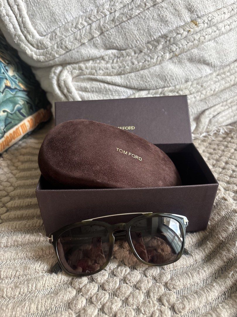 Tom Ford Sunglasses with Case and Box (Category: Sunglasses & Eyewear) located in Manila. Submitted by ivygen2708629 (Listing ID 1461940810, Image 2). Description: - Authentic Tom Ford sunglasses - Dark tortoise shell frames - Silver accents - Original hard case and box included - Ideal for sunny weather - Selling as is.