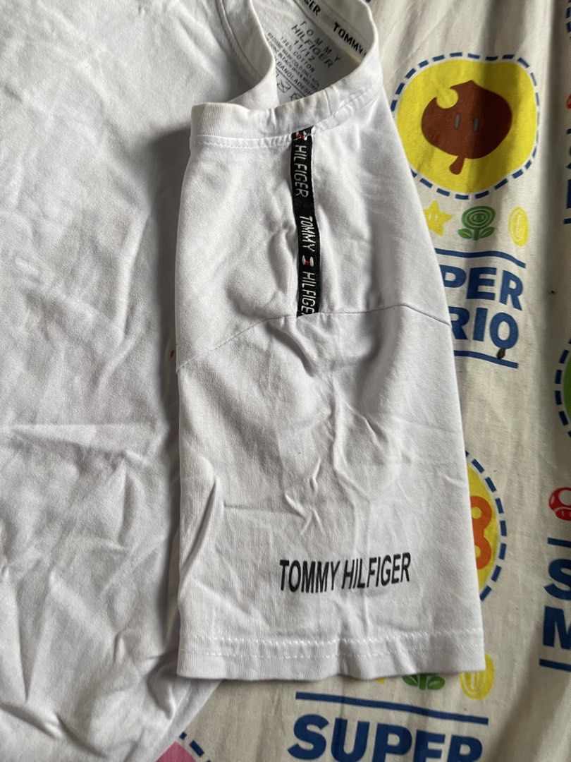 tommy hilfiger shirt (Category: Shirts) located in Palayan City. Submitted by ur_princexxx (Listing ID 1461858547, Image 3). Description: 11-12y on tag can fit small body frame.