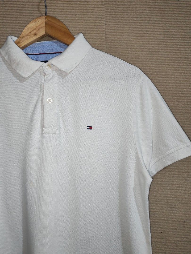 Tommy Hilfiger White Polo Shirt (Category: Tshirts & Polo Shirts ) located in Iligan City. Submitted by wantwears14 (Listing ID 1461866064, Image 3). Description: Guaranteed Authenticity Needs wash only 9.8/10 color rate Favorite polo Very Presentable It can fit Medium sizes body frame.