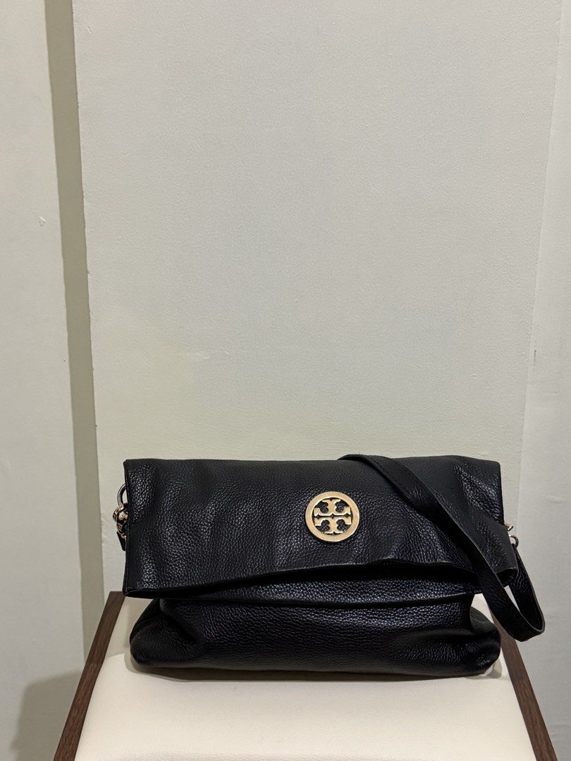 Tory Burch - Black Sling Bag (Category: Cross-body Bags) located in Cagayan de Oro. Submitted by soidee (Listing ID 1461907087, Image 1). Description: Tory Burch - Black Sling Bag No original strap Can negotiate RFS: extra bag.