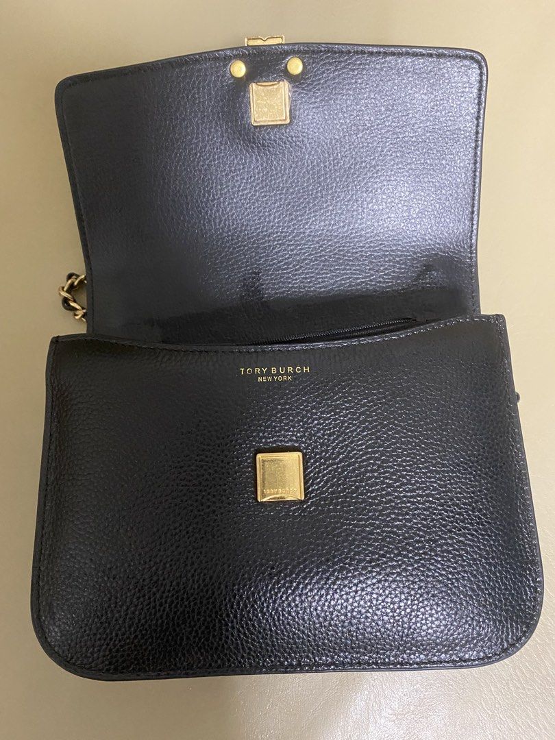 Tory Burch Black Leather Chain Shoulder Bag (Category: Luxury Bags & Wallets) located in Manila. Submitted by aikara683 (Listing ID 1461965253, Image 3). Description: - Authentic Tory Burch black leather shoulder bag - Features iconic gold logo hardware - Elegant chain strap with leather detailing - Spacious main compartment - Interior zip pocket for essentials - Versatile style, ideal for day or evening wear.