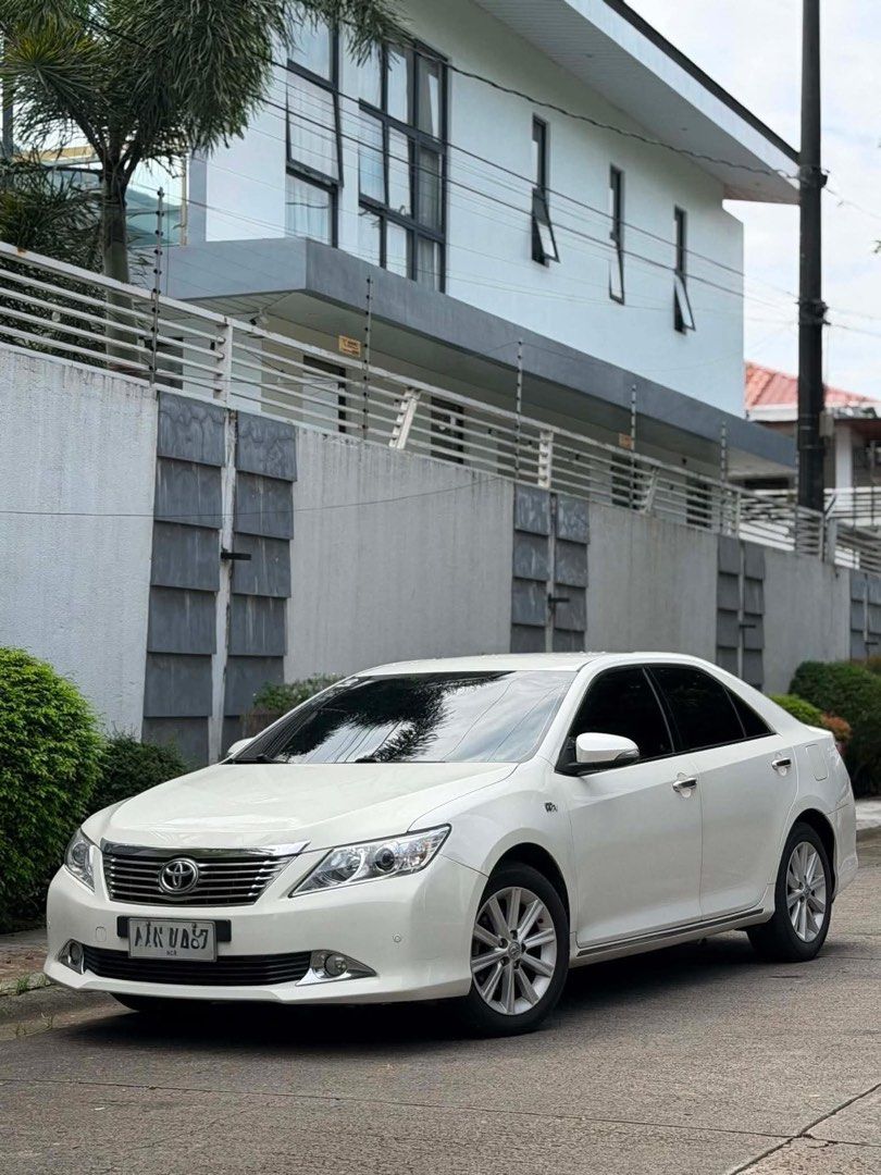 Toyota Camry 2.4V Executive Auto (Category: Used Cars) located in Manila. Submitted by quality_cars (Listing ID 1461959592, Image 2). Description: Toyota Camry 2.4V Executive 2014model Cash Financing ok Very Fresh condition Complete OR/CR Open Deed of sale All Original Paint very fresh Top of the line Specifications: 2.4 engine very powerful engine Automatic transmission Complete Tools & Reserved Tire Very fresh intact interior Wood panels Fresh 