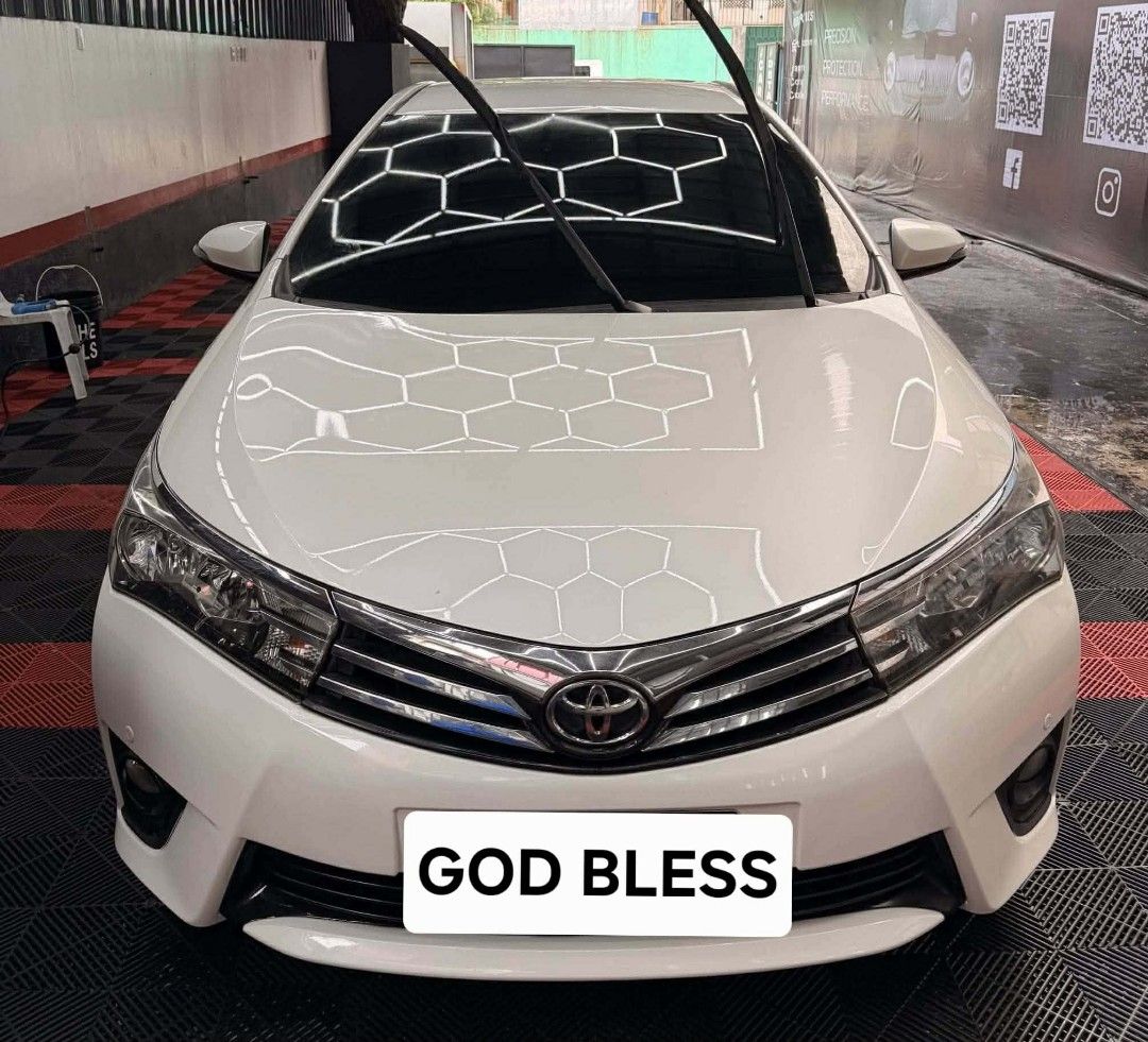 Toyota Corolla Altis 1.6 (A) (Category: Used Cars) located in Cavite. Submitted by karlmartianoliva01 (Listing ID 1461863465, Image 1). Description: Toyota altis 1.6 V 2017 model Automatic transmission Complete orig papers/docs 87k orig mileage Registered until june 2027 Pearl white Ice cold aircon Intact interiors Thick tires Newly pms Sept./14/2026 (change oil and filter) Tire 225/45/R18, (2024 production date) Advanti racing wheel Front and re