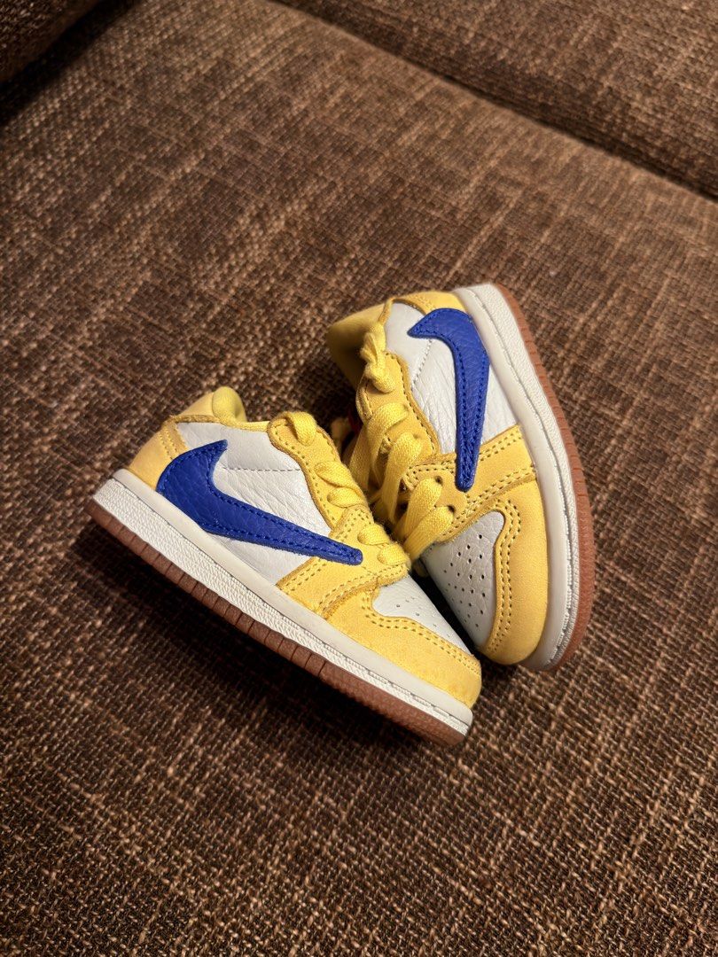 Travis scott x Jordan 1 Low 'Canary' (Category: Babies & Kids Fashion) located in Manila. Submitted by cool_meowmeow (Listing ID 1461835501, Image 2). Description: Size 4C / EU 19.5 / 10CM 📦 With original box ✨ Bought directly from Nike Indonesia ✨ Authentic ✨ Still in good preloved condition ✨ Normal signs of wear/creasing ✨ May need cleaning/wash to freshen up Outgrown na ni baby kaya selling. Sayang lang nakatambak na since hindi na kasya. PM