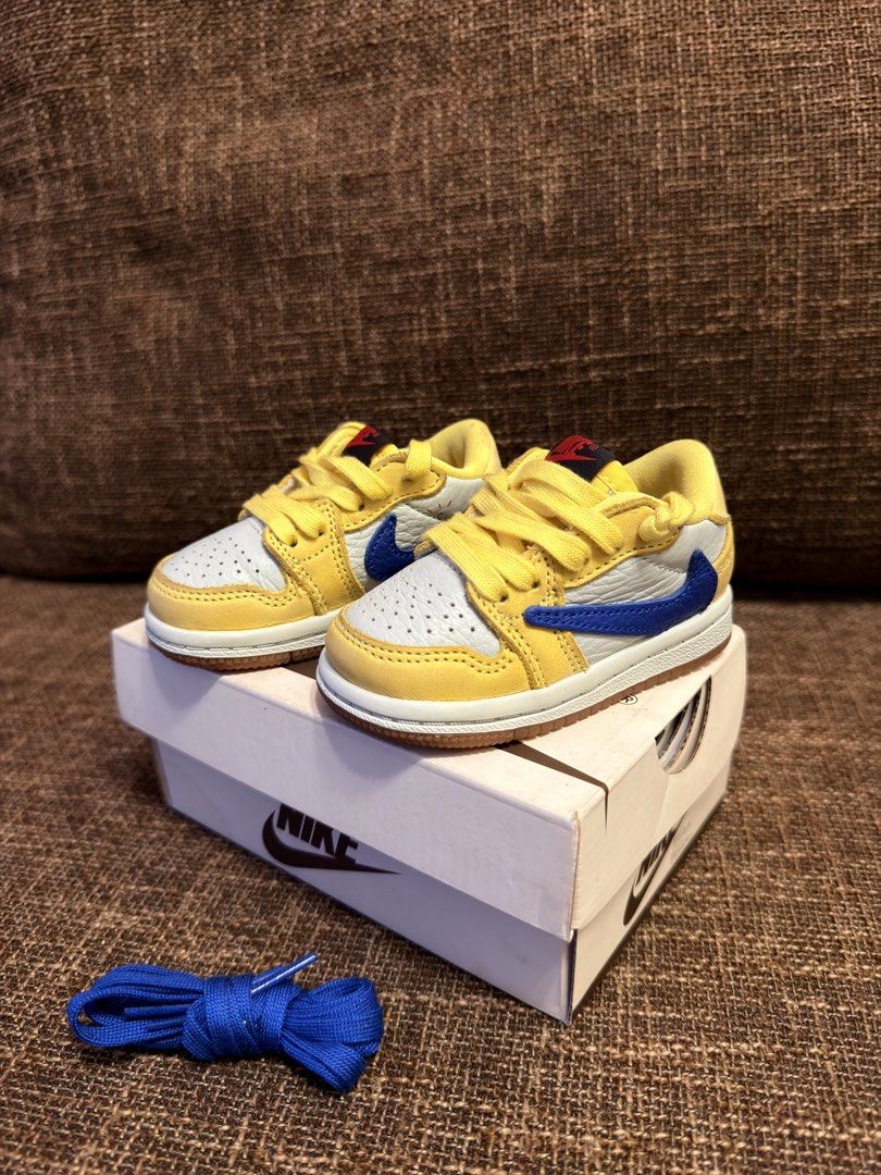 Travis scott x Jordan 1 Low 'Canary' (Category: Babies & Kids Fashion) located in Manila. Submitted by cool_meowmeow (Listing ID 1461835501, Image 3). Description: Size 4C / EU 19.5 / 10CM 📦 With original box ✨ Bought directly from Nike Indonesia ✨ Authentic ✨ Still in good preloved condition ✨ Normal signs of wear/creasing ✨ May need cleaning/wash to freshen up Outgrown na ni baby kaya selling. Sayang lang nakatambak na since hindi na kasya. PM