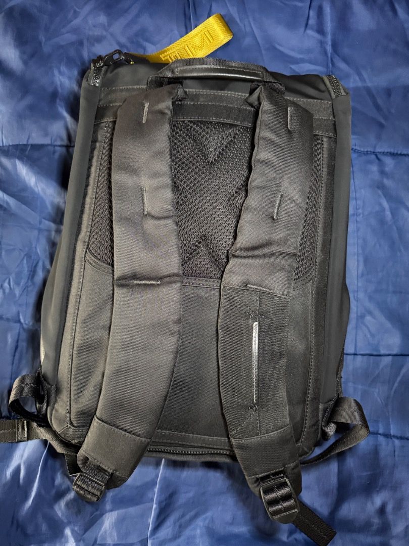Tumi Backpack Black Nylon Yellow Accent (Category: Backpacks) located in Las Pinas. Submitted by nproducts (Listing ID 1461933711, Image 3). Description: Type: Backpack w/ Laptop provision Color: Black Bought from: Tumi Store (Honolulu) Classification: 100% Original item Condition: Good as new, used several times Reason for selling: Im using a new TUMI Alpha Bravo Backpack new edition Selling Price: P 18,000.00 (Negotiable) - Authentic black Tumi
