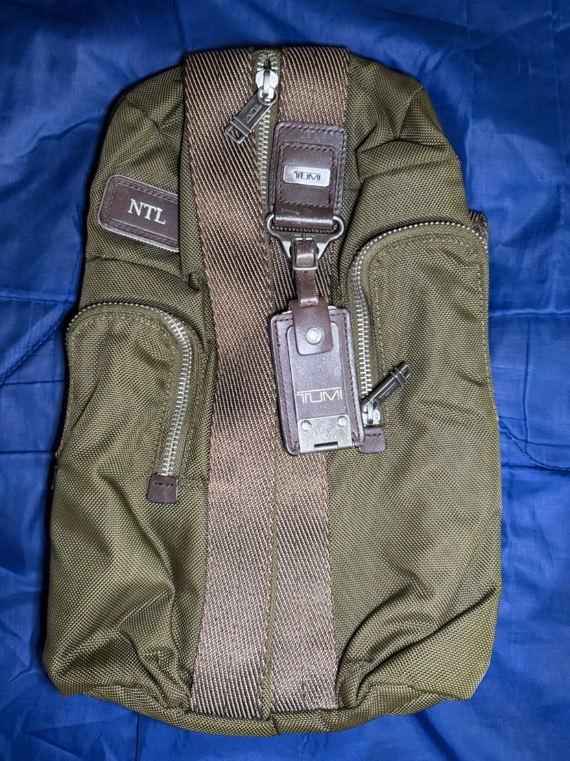 Tumi Green Nylon - Sling Bag (Category: Sling Bags) located in Las Pinas. Submitted by nproducts (Listing ID 1461937511, Image 1). Description: Type: Sling Bag Color: Army Green (Adjustable body strap) Bought from: TUMI Store - Manila Classification: 100% Original item Condition: Good as new, used several times Reason for selling: Not using it anymore (Decluttering) Selling Price: P 8,000.00 (Negotiable) - Olive green Tumi sling bag - Durable nyl