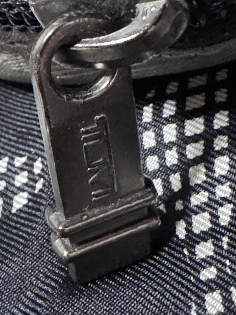 TUMI pouch (Category: Luxury Accessories) located in Marikina City. Submitted by luvbags40524 (Listing ID 1461921072, Image 1). Description: Good condition Dm for interested .