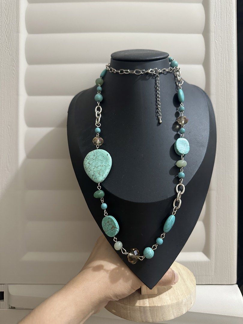 Turquoise and Silver Tone Beaded Statement Necklace (Category: Necklaces) located in Naga. Submitted by bag.net (Listing ID 1462026004, Image 3). Description: - Long beaded necklace(sourced from Japan 🇯🇵) - Turquoise-colored stones - Silver chain links - Mix of large and small beads - Smoky quartz accents - Adjustable length with extender - Versatile: great for layering or wearing alone - Adds a pop of color to any outfit.