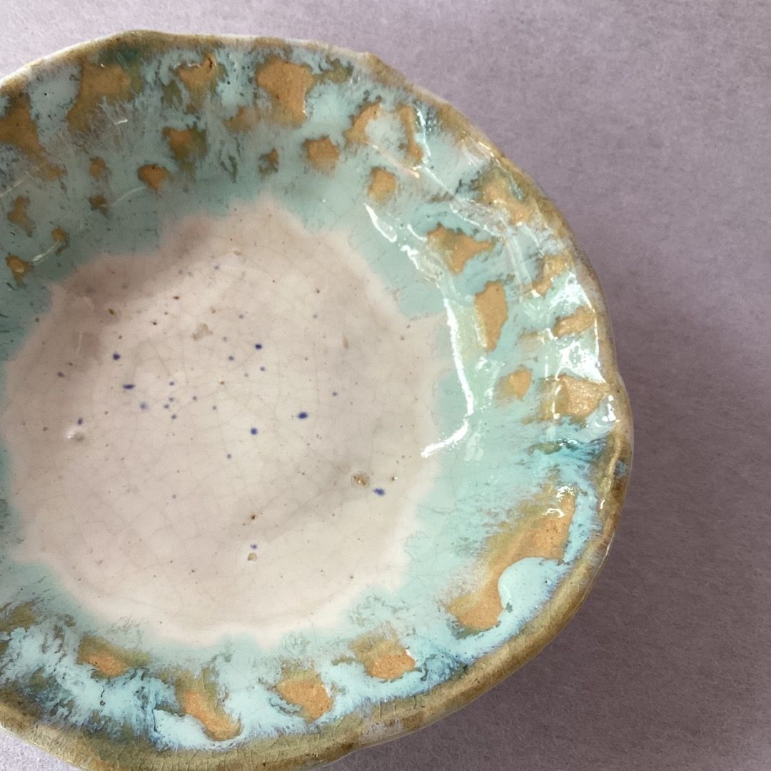 Turquoise Rimmed Fluted Snack Bowl; signed (Category: Vases & Decorative Bowls) located in Davao. Submitted by eclectic1925 (Listing ID 1461961132, Image 3). Description: Php220 Turquoise Rimmed Fluted Snack Bowl; signed *crazing H: 1.9 inches L: 6.5 inches W: 6.2 inches Please REVIEW PHOTOS We use 100% repurposed packaging materials SF starts at Php70 via Flash Express First to pay .