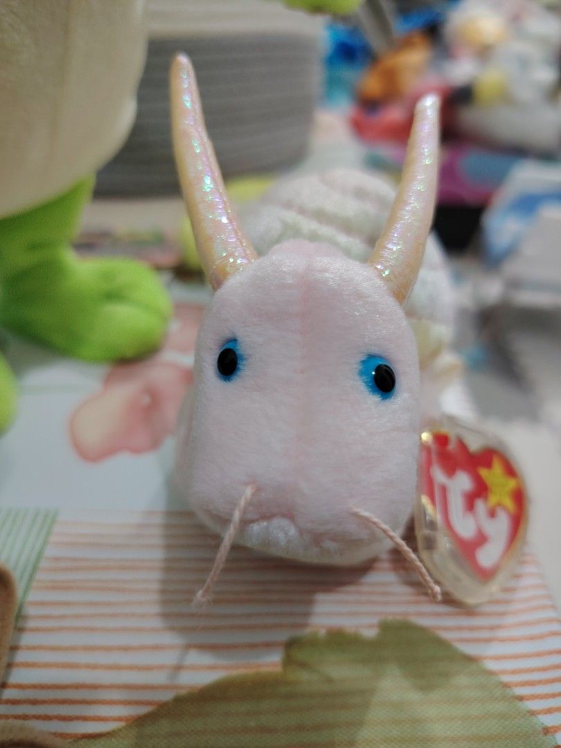 Ty Beanie Baby SWIRLY (Category: Plushies & Soft Toys) located in Pasay City. Submitted by jboxshop (Listing ID 1461968948, Image 3). Description: - Adorable pink snail Beanie Baby - Shell boasts charming pastel rainbow stripes - Comes with the original Ty tag - Ideal for Beanie Baby collectors .