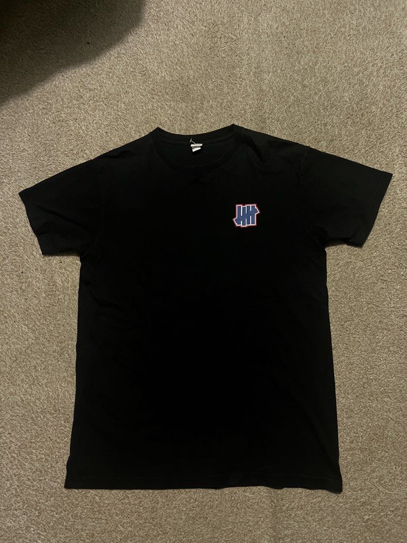 Undefeated Shirt (Category: Tshirts & Polo Shirts ) located in Mexico. Submitted by iseemiyakee. (Listing ID 1461892506, Image 1). Description: Size Large 21 width 29 length no issue excellent condition .