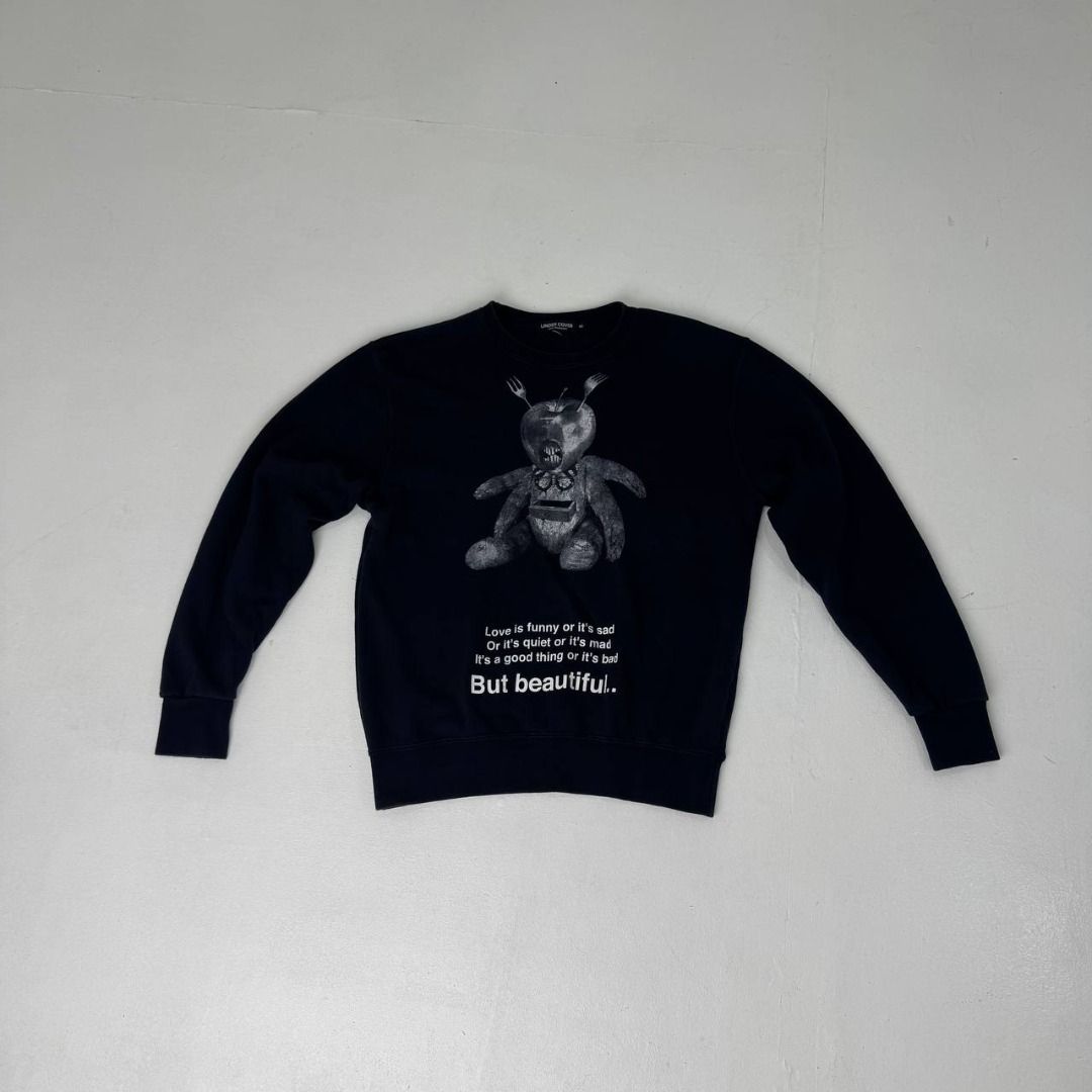 Undercover Teddy But Beatiful L/S crewneck (Category: Luxury Apparel) located in Quezon City. Submitted by johnpaulperezzz (Listing ID 1461904529, Image 1). Description: NAME: Undercover Teddy But Beatiful L/S crewneck COLOR: Black SIZE: Small FIT: Small Dimension: Width: 20 Length: 24 Shoulder: 18 Sleeves: 22 Hem: 15-19 CONDITION: 8.5/10 ISSUE: -crack print at the front of the tee PRICE: 3k .