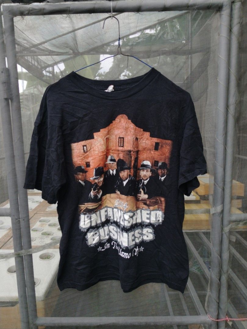 Unfinished Business 2014 Spurs (Category: Tshirts & Polo Shirts ) located in Legazpi City. Submitted by genobecollectives (Listing ID 1461885431, Image 1). Description: Unfinished Business' graphic t-shirt by SPURS team 500 plus sf - Features Alamo and men in suits graphic on front - Back design: 'The Hit List' with crossed-out NBA player names - Year: 2014 print - Size: Medium -20 x 25 - Ideal for collectors and fans dm📩.